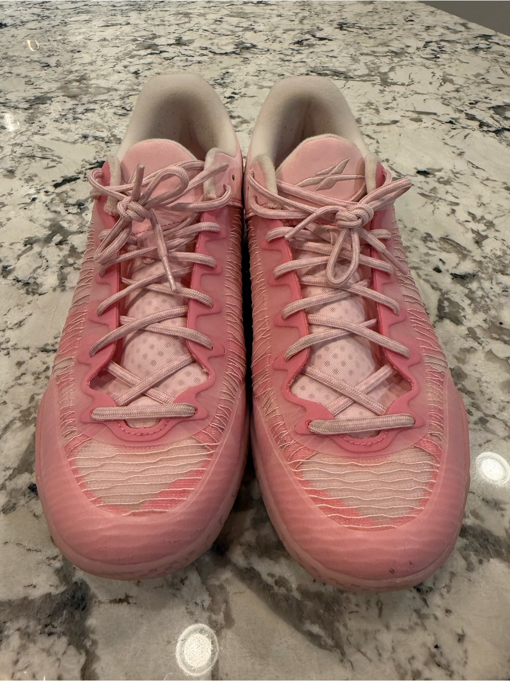 Pink men’s size 13 Serious Players Only low top basketball shoes.